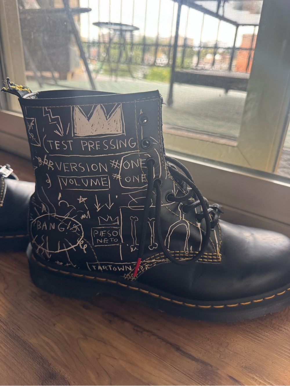 Dr. Martens Black Leather Lace-Up Boot with White Graphic Detail